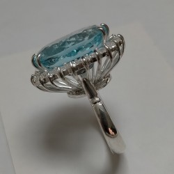Anello a Cestino in Argento con giro Zirconi e centrale Topazio Azzurro