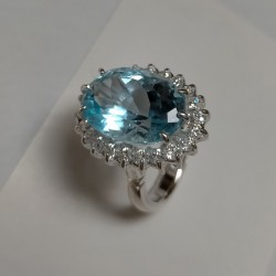 Anello a Cestino in Argento con giro Zirconi e centrale Topazio Azzurro