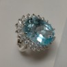 Anello a Cestino in Argento con giro Zirconi e centrale Topazio Azzurro
