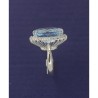 Anello a Cestino in Argento con giro Zirconi e centrale Topazio Azzurro
