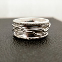 Anello Fascione Imbutito in Argento con fili intrecciati